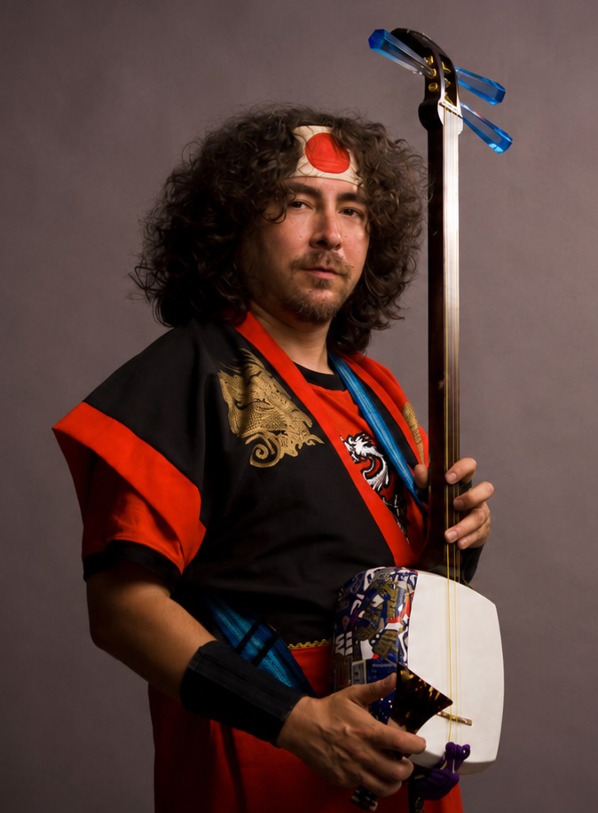 Kevin Kmetz playing shamisen